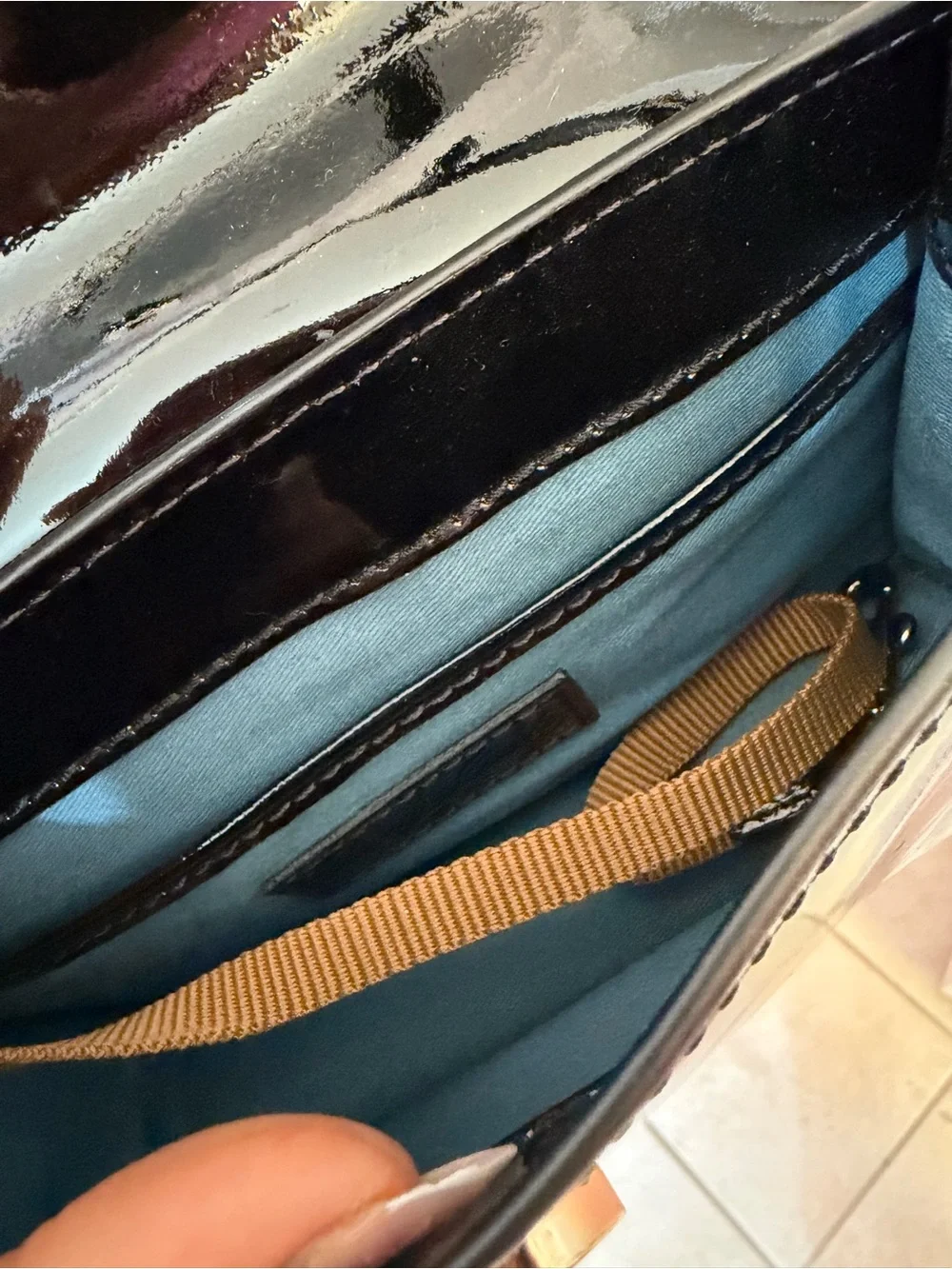 Dooney & Bourke Black Patent Leather Crossbody with Gold Plaque